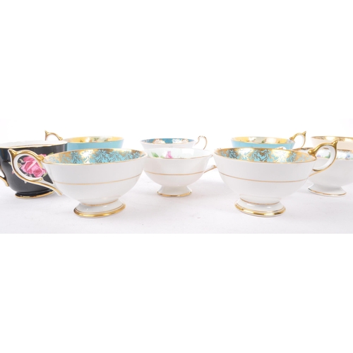 74 - Aynsley - A collection of ten 20th Century fine bone china porcelain cabinet teacups majority stampe... 