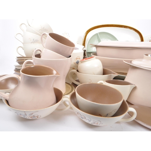 91 - Poole Pottery - A large collection of mid 20th century Poole Pottery ceramic Twintone C54 tableware.... 