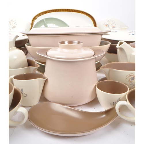 91 - Poole Pottery - A large collection of mid 20th century Poole Pottery ceramic Twintone C54 tableware.... 