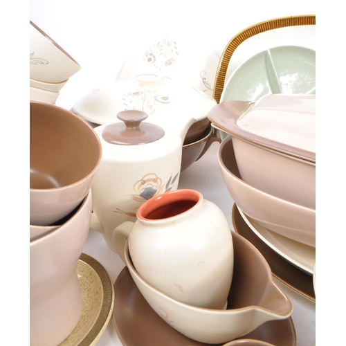 91 - Poole Pottery - A large collection of mid 20th century Poole Pottery ceramic Twintone C54 tableware.... 