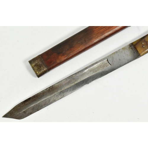 120 - A 19th Century Tibetan ethnic dagger. Capped metal pommel with a rhino horn grip secured with rivets... 