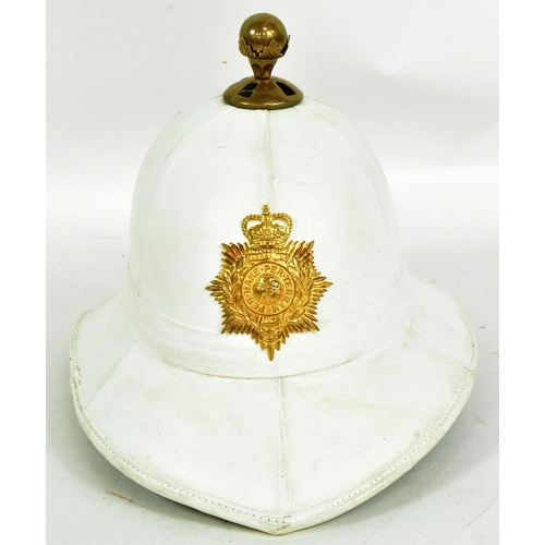 122 - A 20th Century Queen Elizabeth II era Royal Marines Band Wolseley pith / topee helmet. White rigid f... 