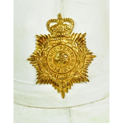 122 - A 20th Century Queen Elizabeth II era Royal Marines Band Wolseley pith / topee helmet. White rigid f... 