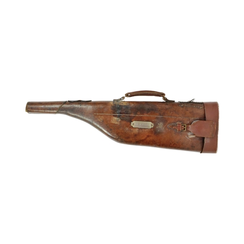 131 - An early 20th Century ' Leg of Mutton ' shotgun case. Leather construction with brass lock plate, wh... 