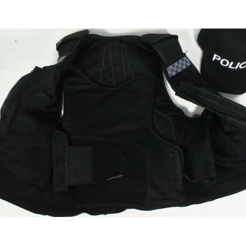 14 - Local interest - an original vintage Somerset & Avon Police Armed Response vest & cap with various u... 