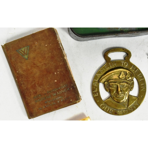 152 - A collection of assorted First and Second World War militaria to include; WWI Victory medal awarded ... 