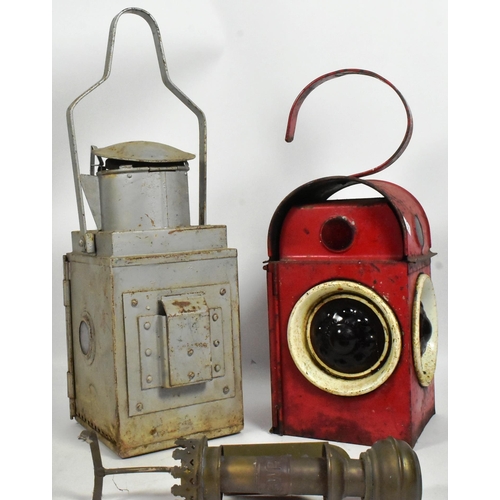 159 - Railwayana - a collection of x3 vintage railway lamps comprising a wall mounted brass GWR candle bur... 