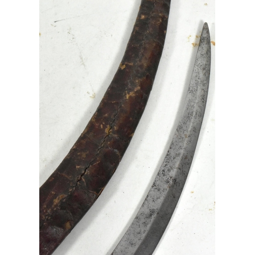 160 - A late 18th Century East African native Ethiopian Shotel sword. Large sickle shaped blade with a cen... 