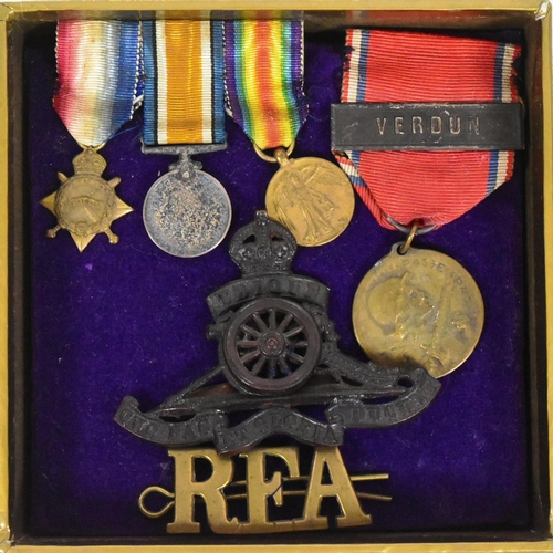 163 - A collection of WWI First World War British medals and badges awarded to one 9853 Bmbr Acting Sgt G.... 