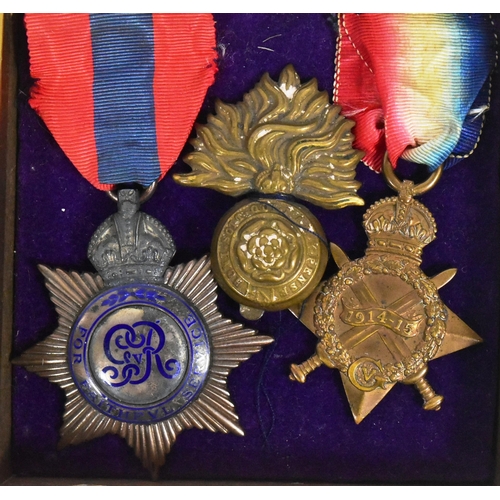 163 - A collection of WWI First World War British medals and badges awarded to one 9853 Bmbr Acting Sgt G.... 