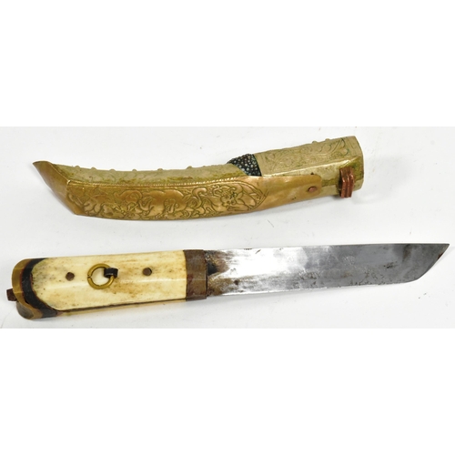 168 - A 19th Century Tibetan / Bhutanese ladies belt knife. Bone handle secured to the tang with rivets, c... 