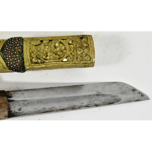 168 - A 19th Century Tibetan / Bhutanese ladies belt knife. Bone handle secured to the tang with rivets, c... 