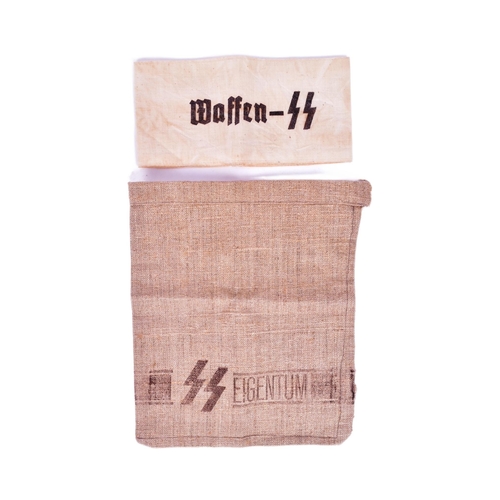 169 - A WWII Second World War Third Reich Nazi German Waffen SS armband along with a small SS linen sack s... 