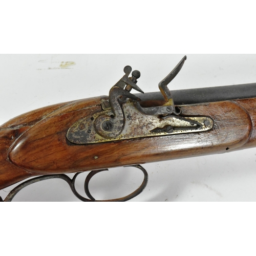 171 - A 19th Century flintlock musket rifle. The barrel marked with a crowned BP for Birmingham proof test... 