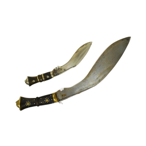 181 - Two vintage Nepalese / Gurkha style kukri knife daggers. Typical form with bone and horn hilts inlai... 