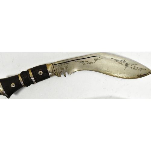 181 - Two vintage Nepalese / Gurkha style kukri knife daggers. Typical form with bone and horn hilts inlai... 