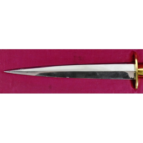 191 - An original British FS Fairbairn Sykes presentation commando dagger. Gilt metal grip and crossguard ... 