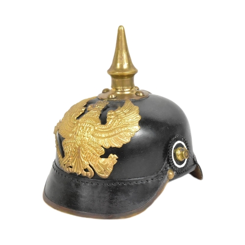 197 - A reproduction WWI First World War Imperial German / Prussian Army 1860 pattern pickelhaube helmet. ... 