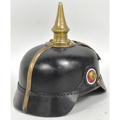 197 - A reproduction WWI First World War Imperial German / Prussian Army 1860 pattern pickelhaube helmet. ... 