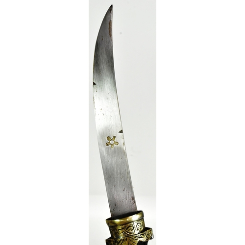 198 - An early 20th Century Moroccan Koummya Jambiya dagger. Dome shaped white metal pommel with a waisted... 