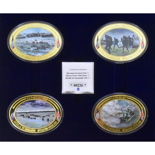 206 - Two cased Windsor Mint Second World War D-Day interest commemorative medallions, a Bradford Exchange... 