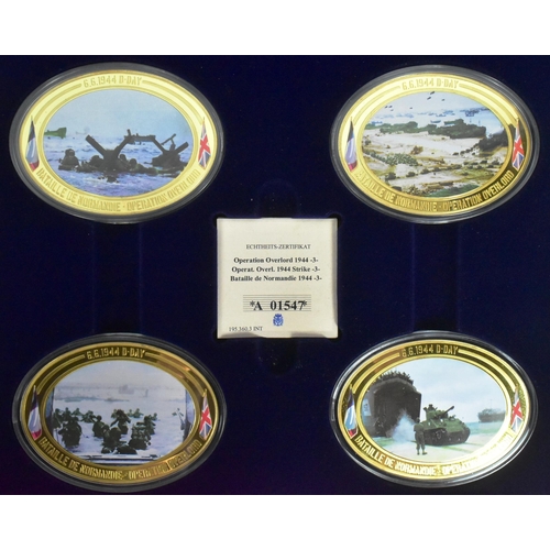 206 - Two cased Windsor Mint Second World War D-Day interest commemorative medallions, a Bradford Exchange... 