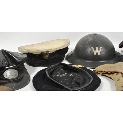 211 - A collection of assorted caps and helmets a WWII Second World War British Home Front Wardens Brodie ... 