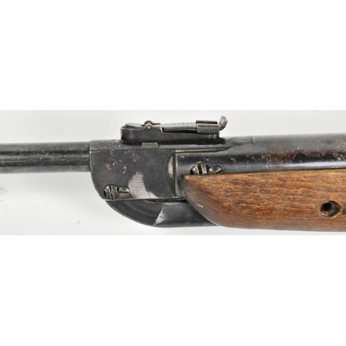 212 - A vintage 1970s Diana .22 calibre Model 25 break barrel air rifle. Wooden stock, with maker's marks ... 