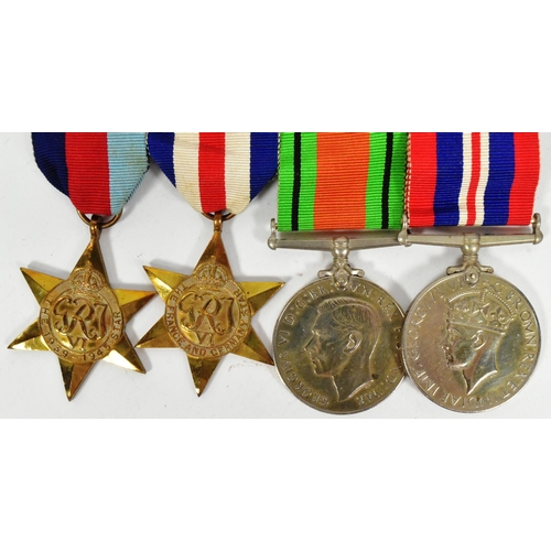 228 - A WWII Second World War medal group comprising British War medal, Defence medal, France & Germany St... 