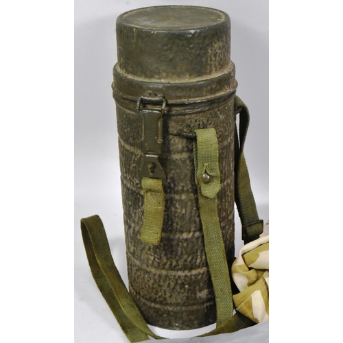 238 - A large collection of assorted militaria to include parts of British Military kit, Gulf War uniform ... 