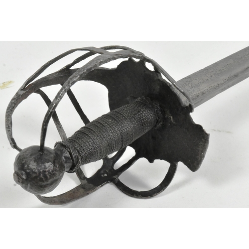 26 - A 17th Century English Civil War basket hilted / mortuary sword. Iron open basket hilt, wire bound g... 