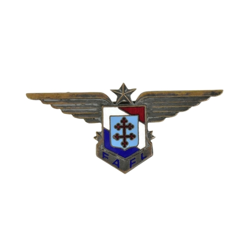 268 - A WWII Second World War Free French Air Force badge. A star between a pair of stylized wings and a c... 