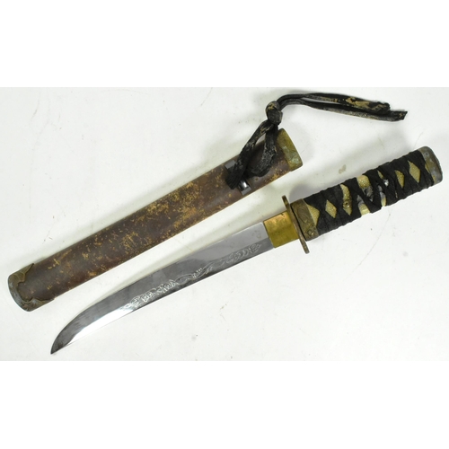 273 - A 20th Century vintage Japanese Samurai Tanto knife / dagger. Rope bound celluloid grip with a brass... 