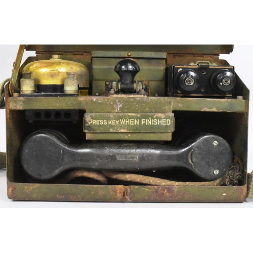 279 - A WWII Second World War British Military issue field telephone set D MK V. The cased telephone with ... 