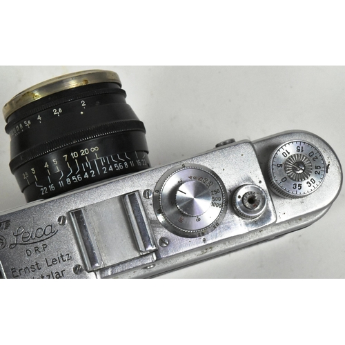 29 - A WWII Second World War Third Reich Nazi German Luftwaffe Leica camera. Stamped above the view finde... 