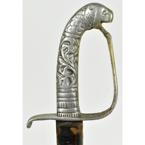 291 - An early 20th Century small Indian parade / dress dagger. White metal hilt in the form of a mythical... 