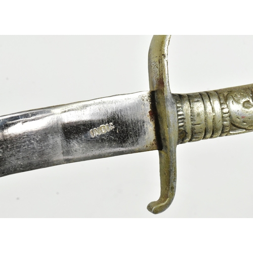 291 - An early 20th Century small Indian parade / dress dagger. White metal hilt in the form of a mythical... 