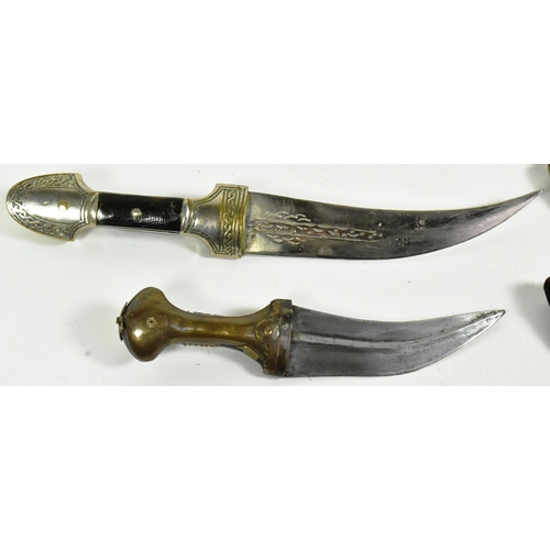 311 - A 19th Century Middle Eastern / Syrian Jambiya dagger together with a smaller Indo Persian Jambiya. ... 