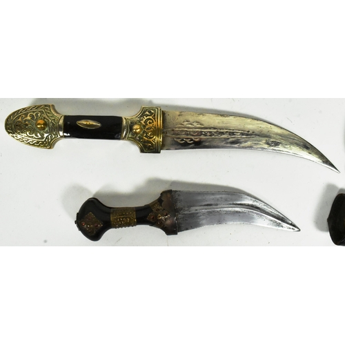 311 - A 19th Century Middle Eastern / Syrian Jambiya dagger together with a smaller Indo Persian Jambiya. ... 