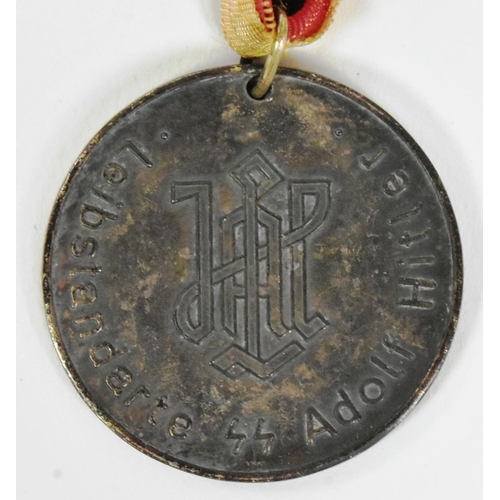 316 - A WWII Second World War Third Reich Nazi German 1st SS Panzer Sports Day medallion. Suspended on red... 