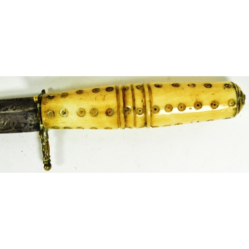 319 - A 19th Century Sudanese Mahdist dagger. Bone grip with circular stamps and a triangular section blad... 