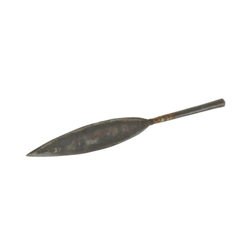 321 - A vintage African tribal spear head with a leaf shaped head and a hollow socket shaft. Measures appr... 