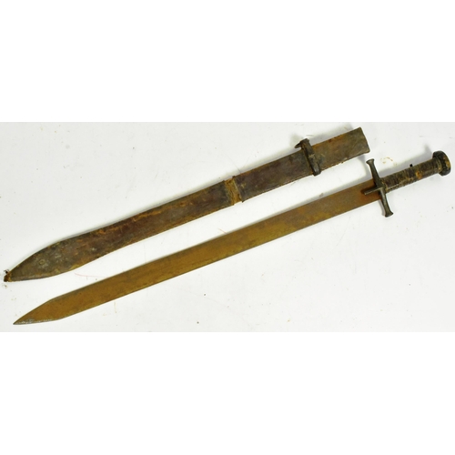 329 - An early 20th Century North African ( Sudanese ) Kaskara sword. Leather bound grip with a cruciform ... 