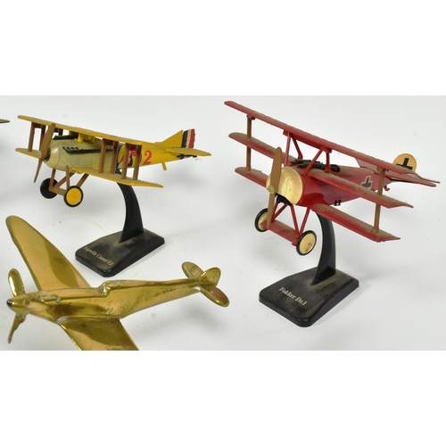 338 - A collection of WWI First World War interest plastic and brass aircraft models to include British So... 