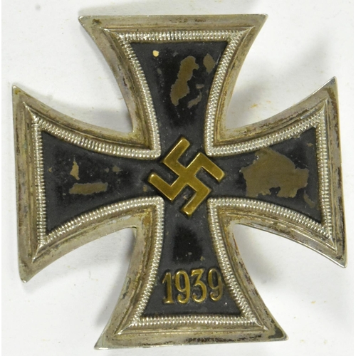 341 - A WWII Second World War Third Reich Nazi German Iron Cross 1st Class. Solid back pin example.

 Due ... 