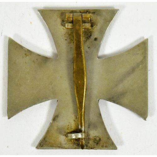 341 - A WWII Second World War Third Reich Nazi German Iron Cross 1st Class. Solid back pin example.

 Due ... 