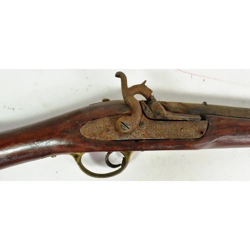 347 - A 19th Century percussion cap muzzle loading musket rifle. The lock plate engraved with scrolling mo... 