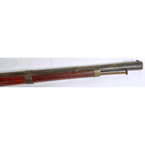 347 - A 19th Century percussion cap muzzle loading musket rifle. The lock plate engraved with scrolling mo... 