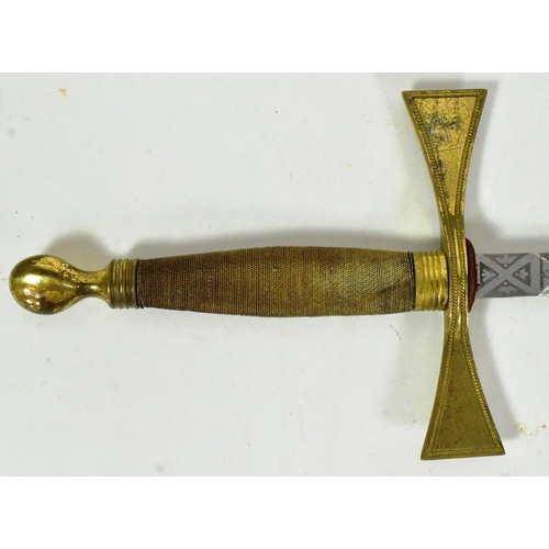 349 - An early 20th Century gentleman's Masonic fraternal sword. The sword having a round brass pommel, gi... 