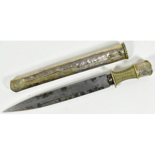 359 - A late 19th Century Tibetan /  Bhutanese dagger. White metal filigree handle with a single edged bla... 